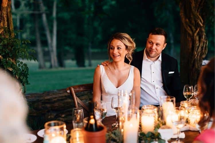 Helen and Chris: A Micro Wedding in Lancaster PA - bride and groom watch their guests toast