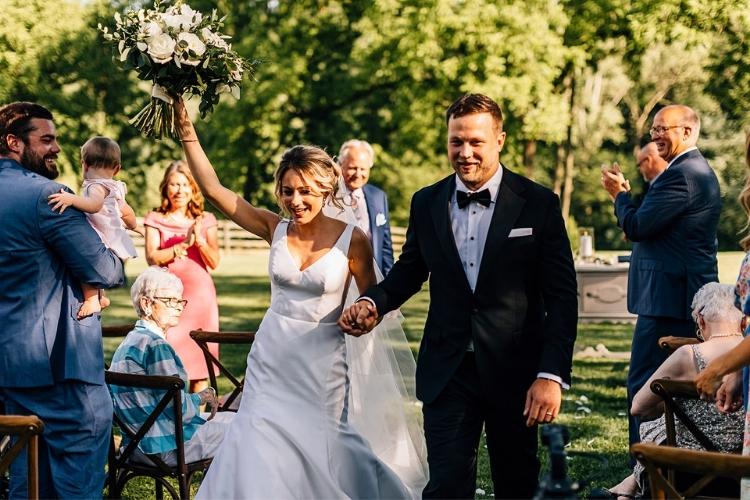 Helen and Chris: A Micro Wedding in Lancaster PA - wedding ceremony bride and groom walking down aisle