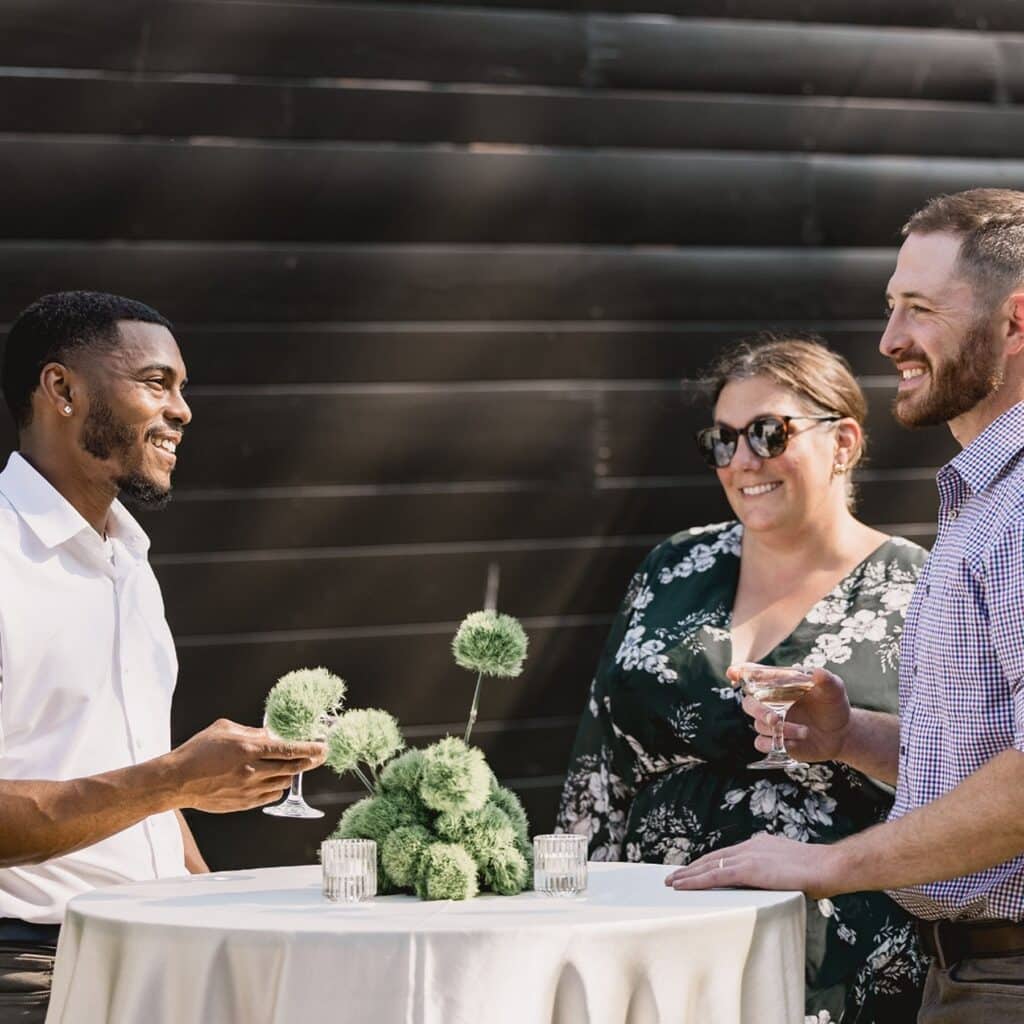 Guests enjoying cocktails and conversation at a catered corporate event in Central Pennsylvania