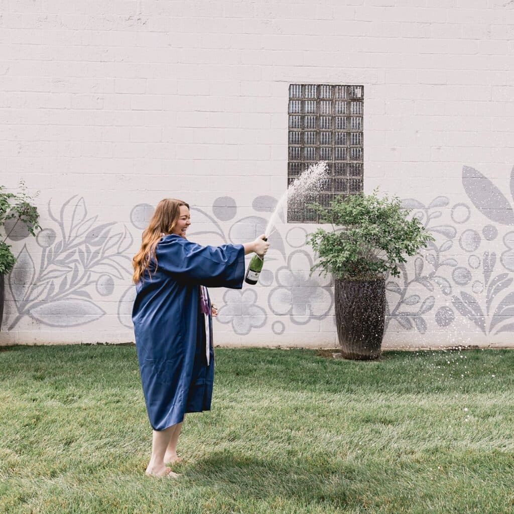 Graduation celebration with champagne pop at a catered event in Central Pennsylvania